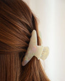 PINCE À CHEVEUX BLANCHE