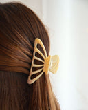 PINCE À CHEVEUX JAUNE