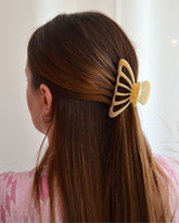 PINCE À CHEVEUX JAUNE