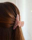 PINCE À CHEVEUX ROSE