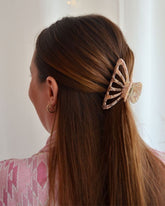 PINCE À CHEVEUX ROSE